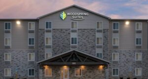 Now Open: WoodSpring Suites Downers Grove | Holladay Properties