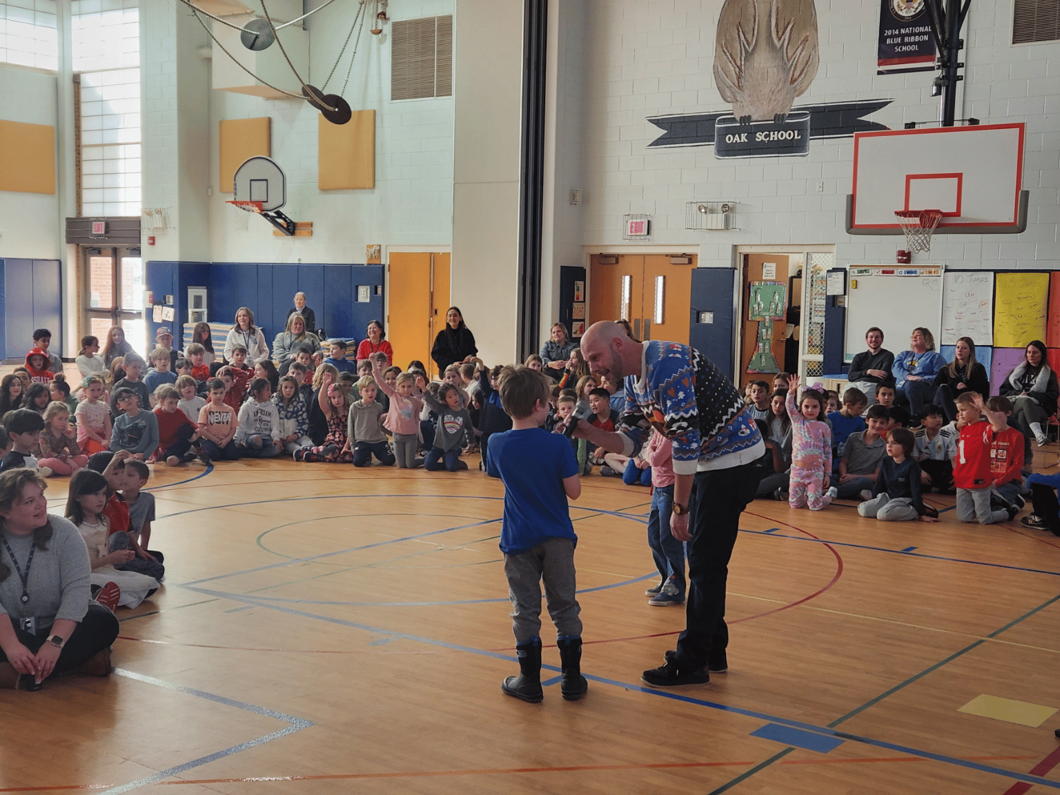 Drew Mitchell, SVP of Development at Holladay Properties, spoke to Oak Elementary School about kindness